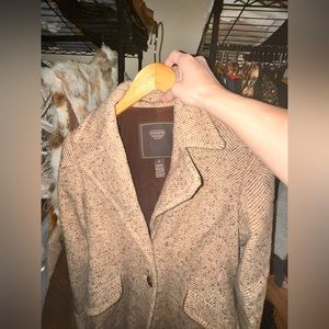 Coach leatherware 85% wool 15%nylon linning 100 %